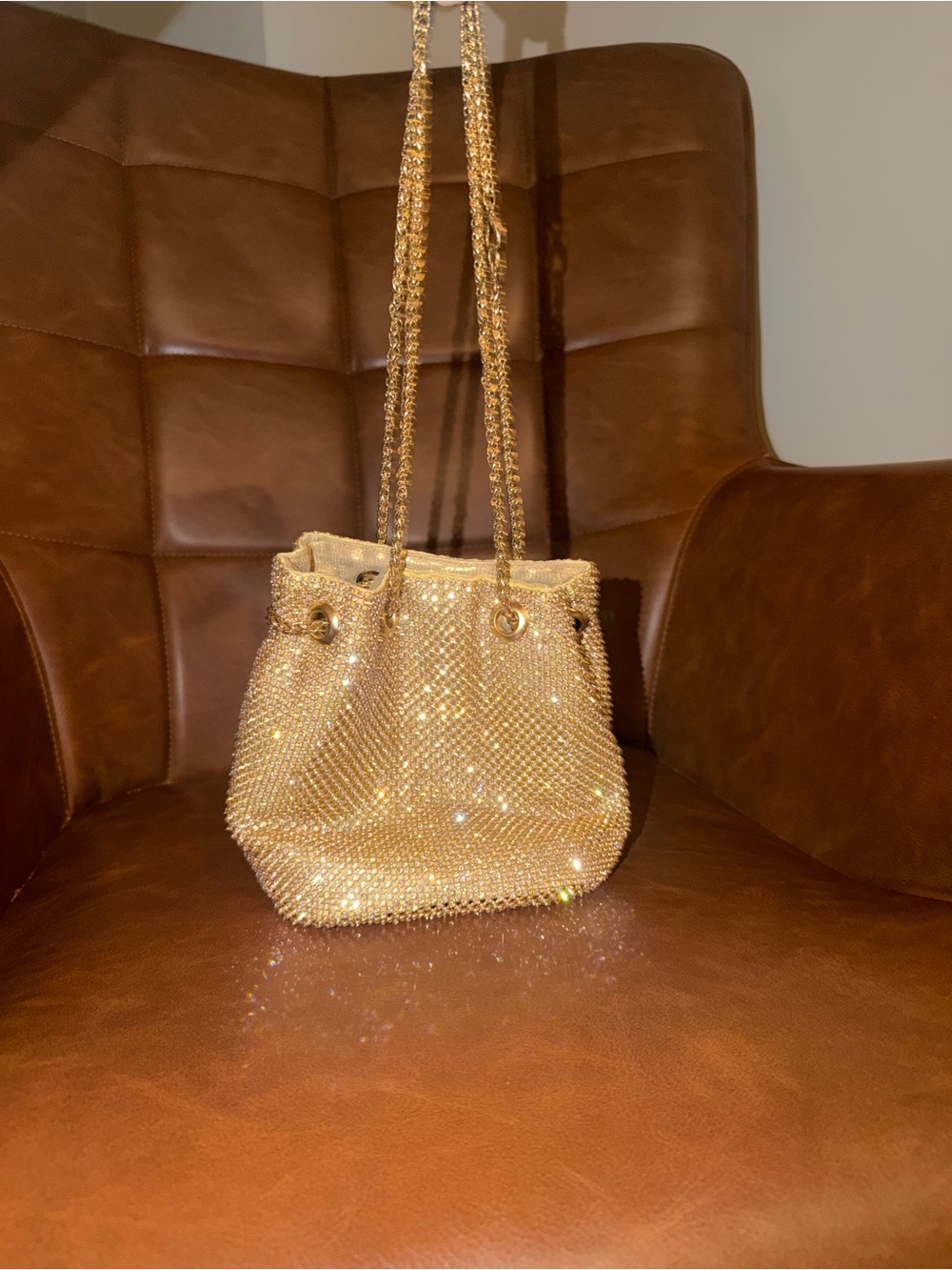 Gold Crystal-Embellished Drawstring clutch